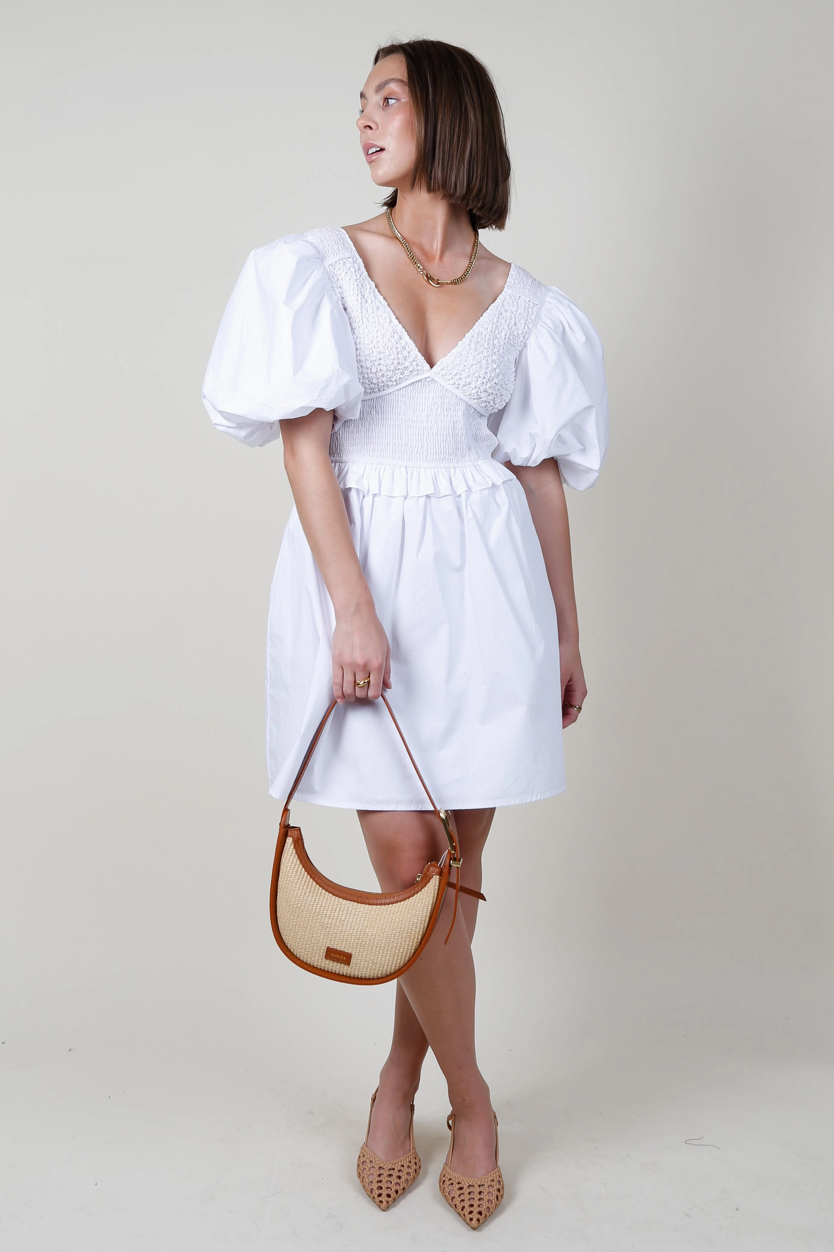 Nature Inspired AUREUM | Smocked Puff Sleeve Mini Dress - White