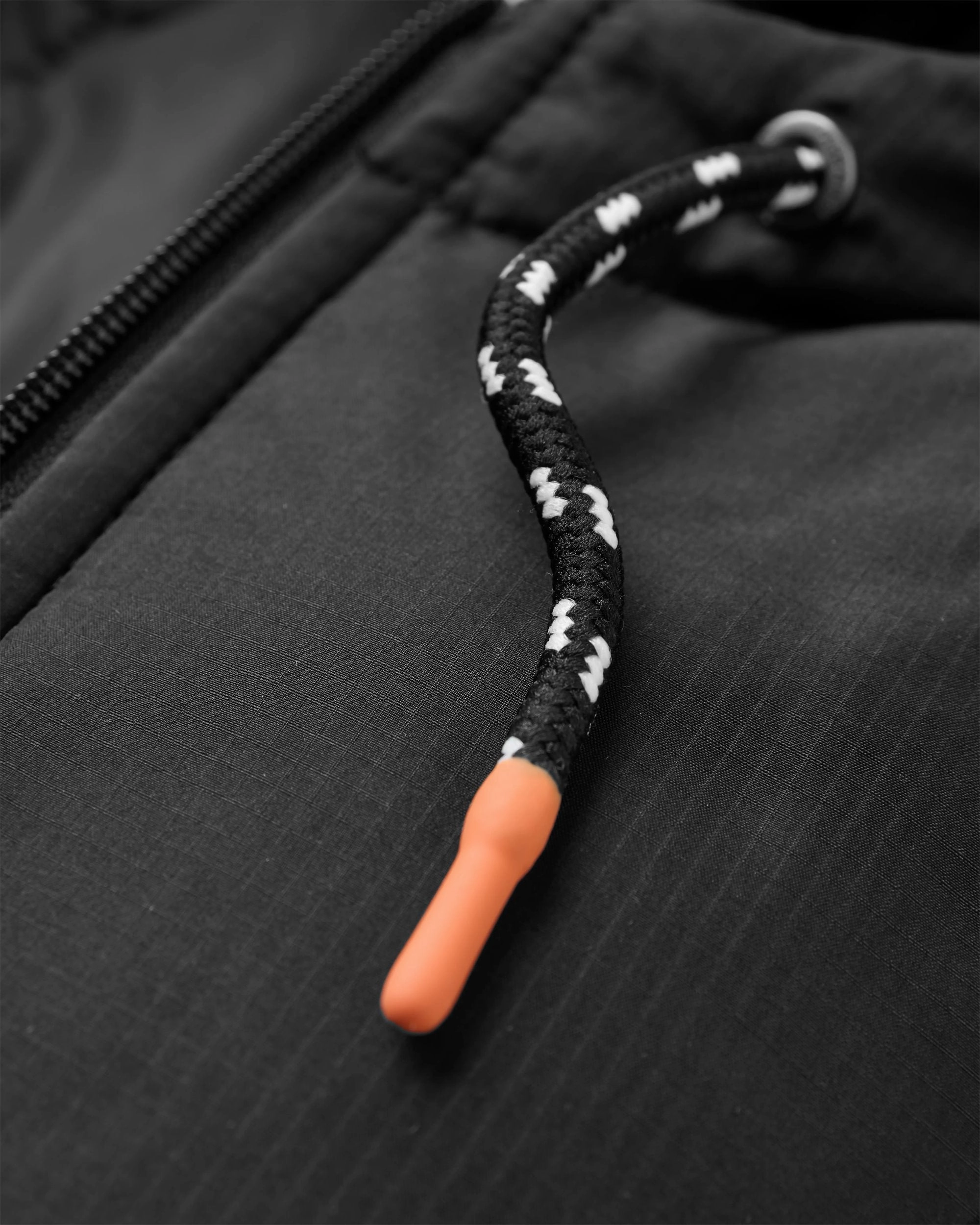 Oceanic Recycled Insulated Anorak - Black/Retro Orange Seamless Edge Finishing