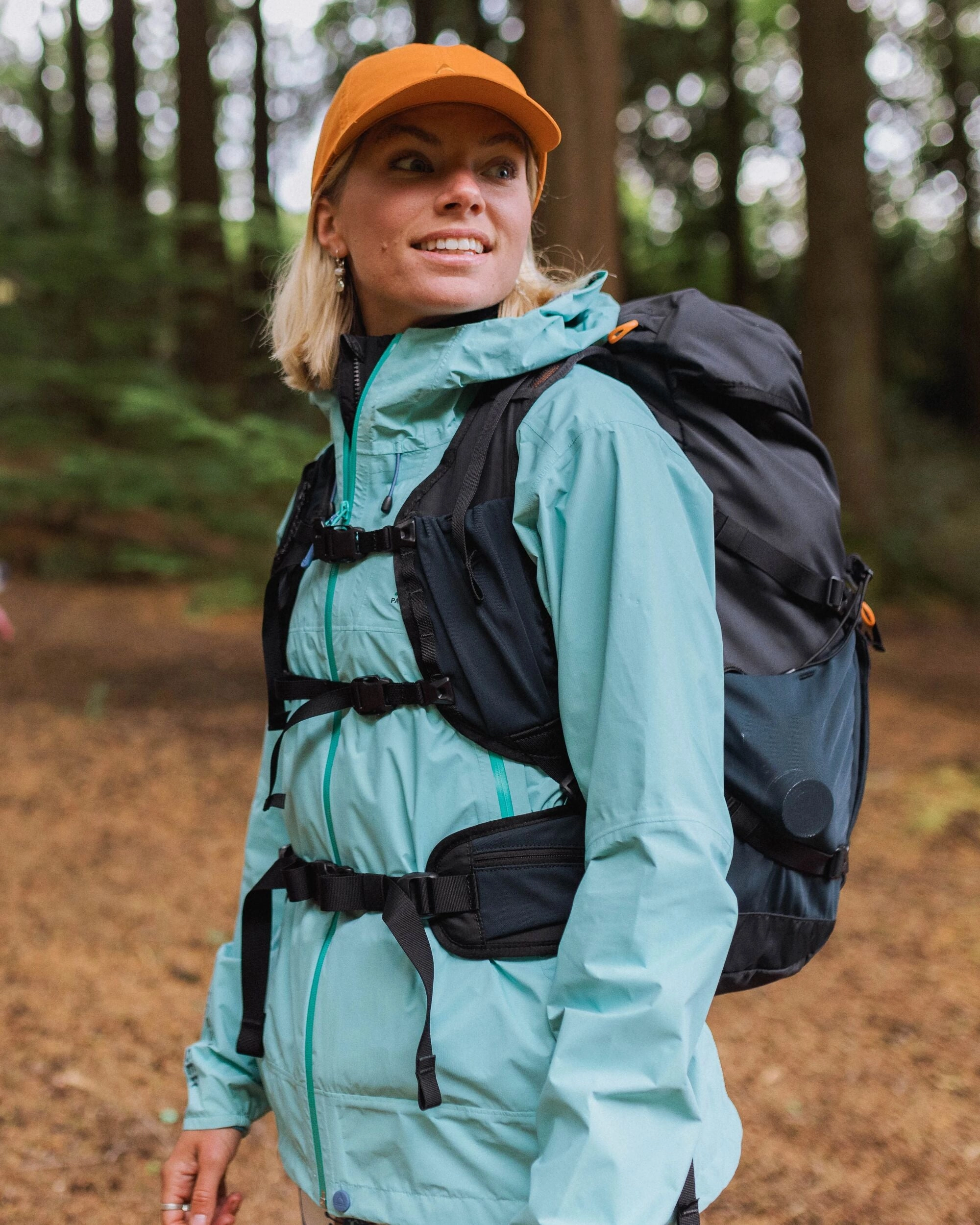 Trailscape Light Women's Recycled Waterproof Jacket - Aqua Quick Access Closures