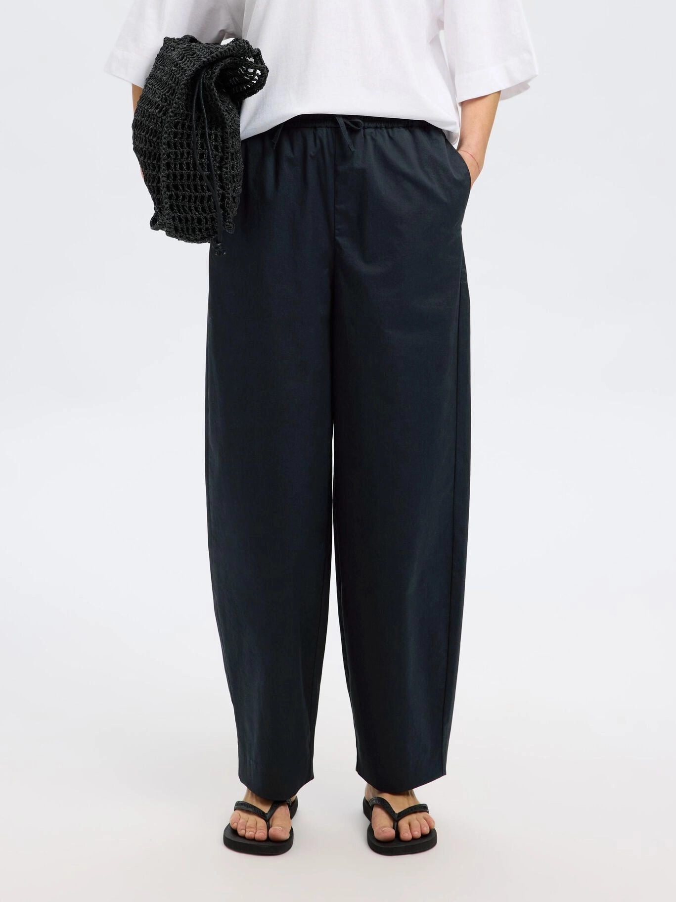 SELECTED Juma Loose Barrel Pant in Black Tear Resistant Design