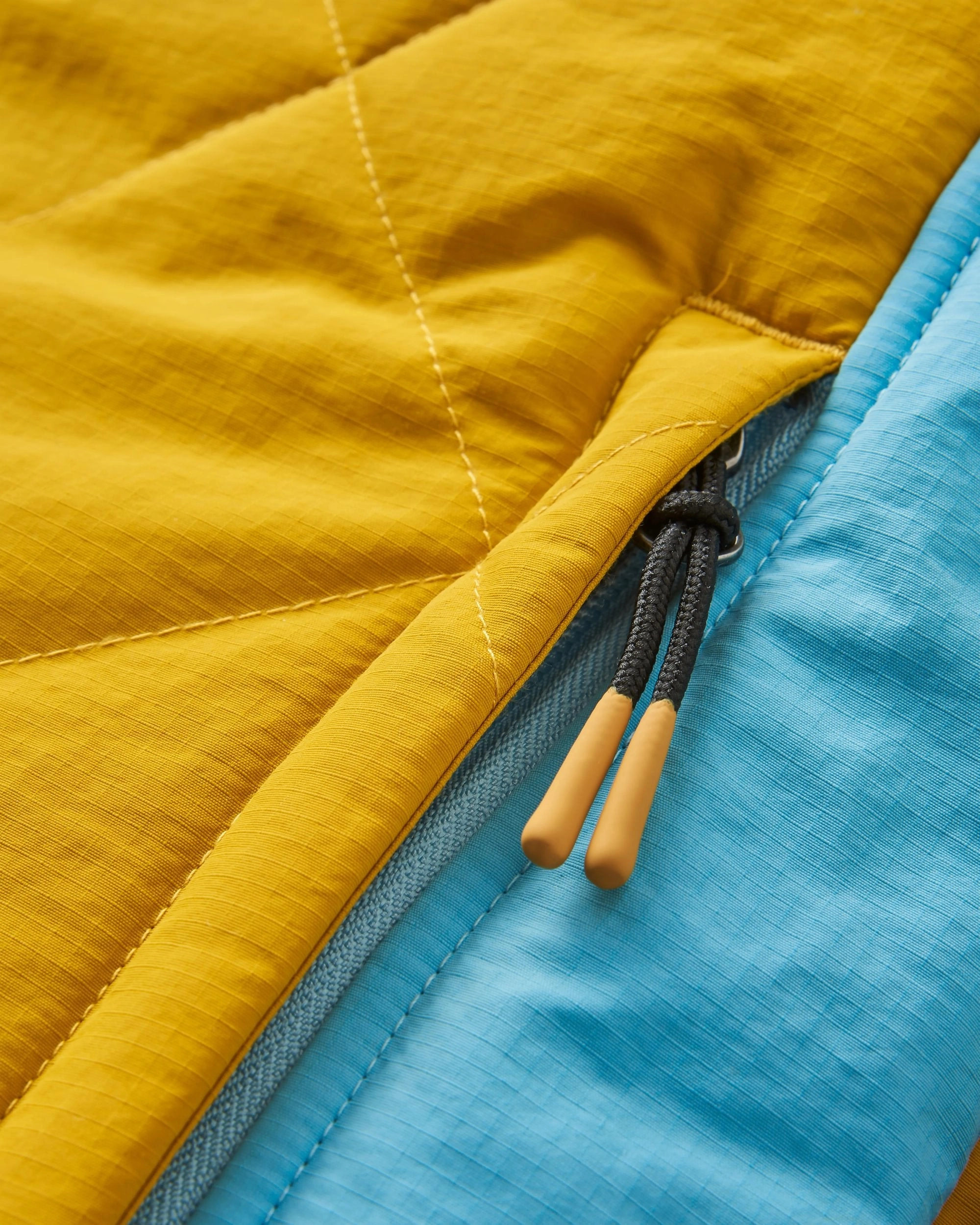 Ocean Recycled Insulated Anorak - Dusty Olive/Heritage Yellow Flatlock Seam Construction