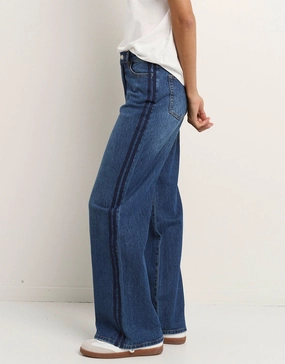 Iconic Outfit Loose Modern Minimalist Manhattan Mid Rise Side Stripe Wide Leg Jean - Mid Blue