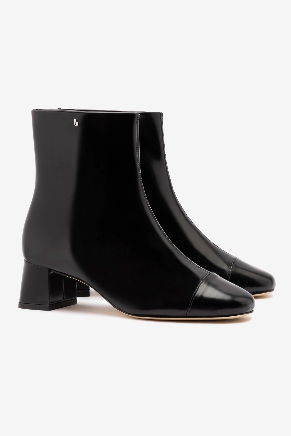 All-Weather Design. Mini Edie Boot In Black Box Leather