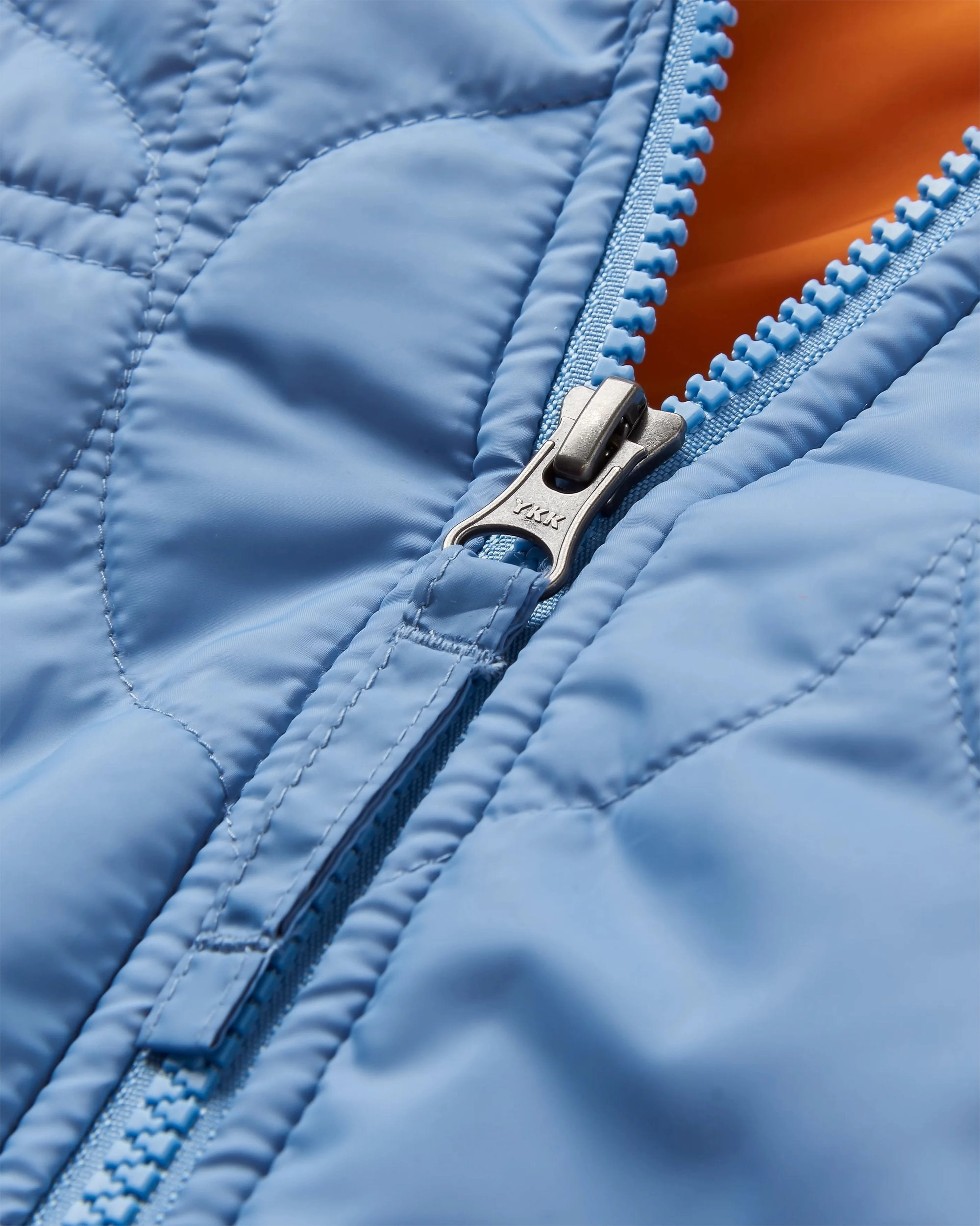 Flora Long Recycled Insulated Parka - Faded Denim Flexible Shoulder Design