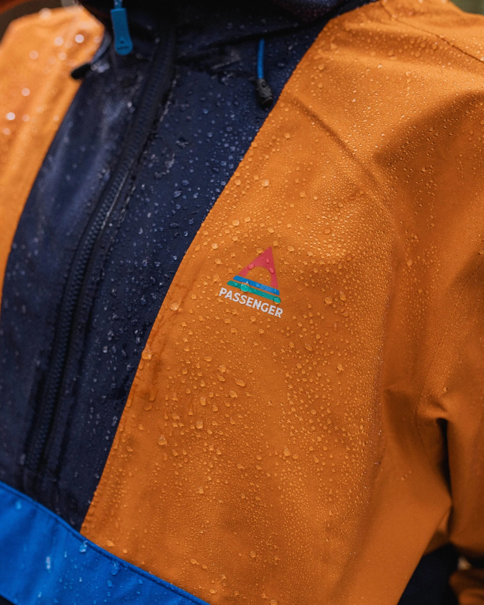 Skyline Recycled Waterproof Anorak - Sunrise Orange Wrinkle Free Exterior