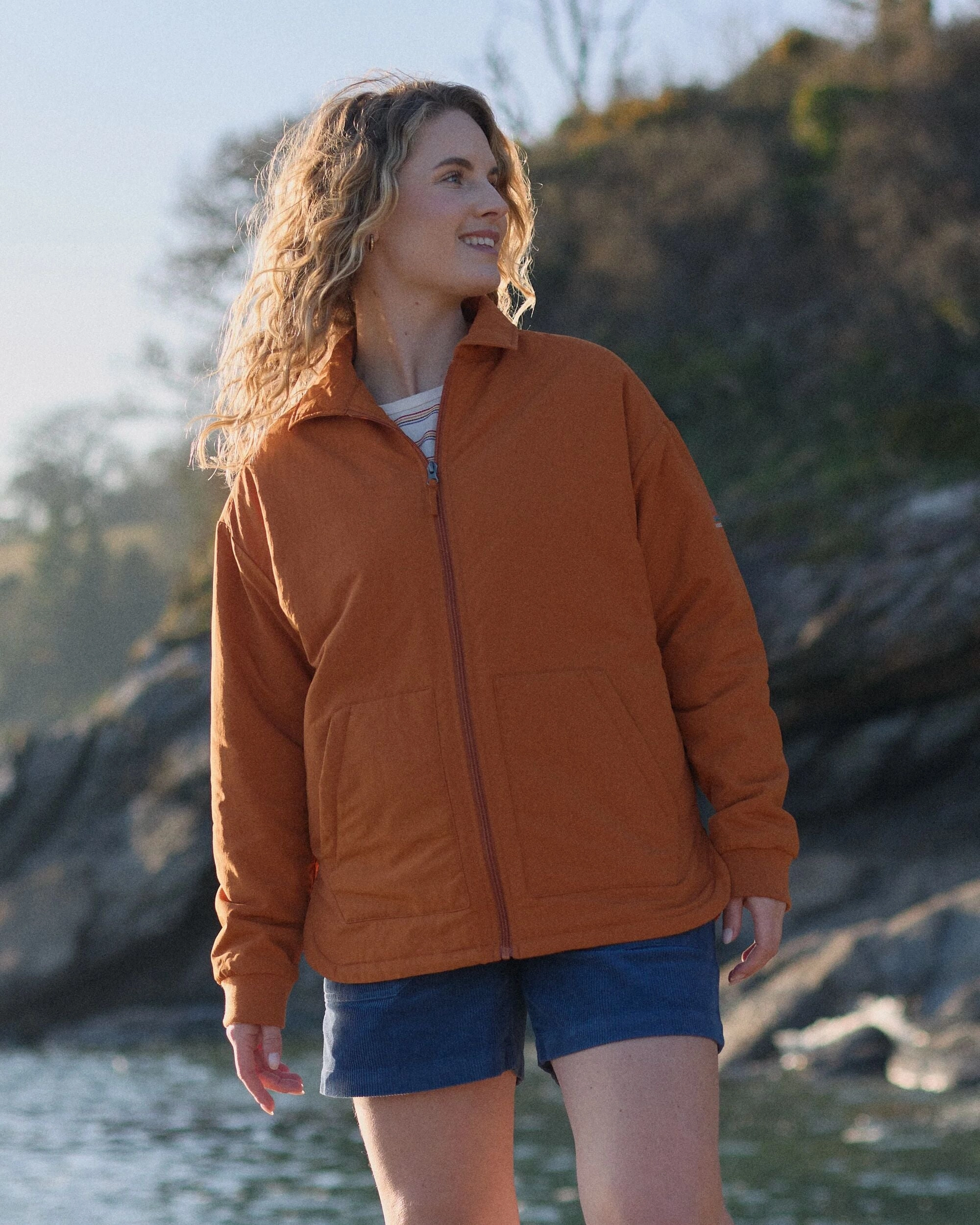 Tasi Recycled Insulated Jacket - Sunset Orange Flexible Zipper Guards Thermoplastic Elastomer Trim
